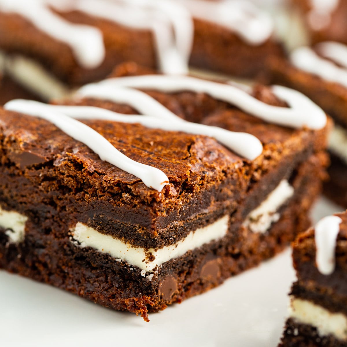 Oreo Stuffed Brownies on a white plate.