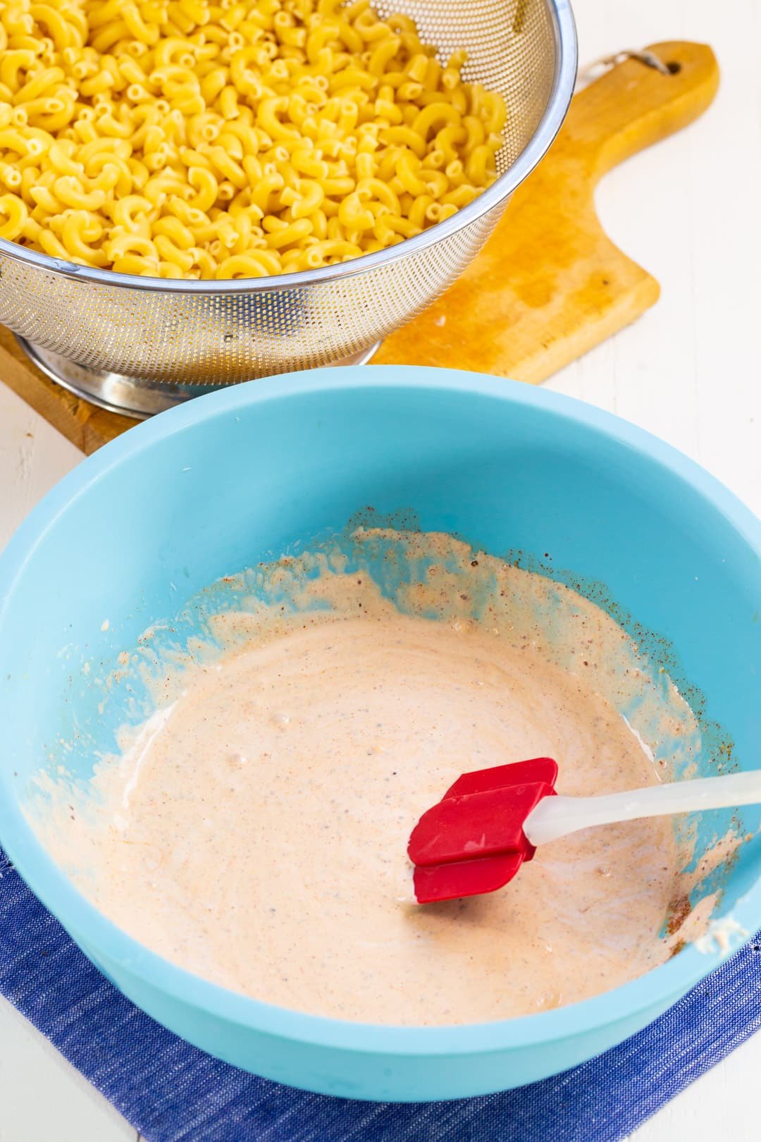 Dressing for macaroni salad in a bowl.