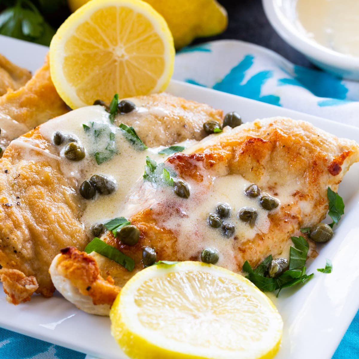 Chicken with Lemon Butter Sauce on a serving platter.