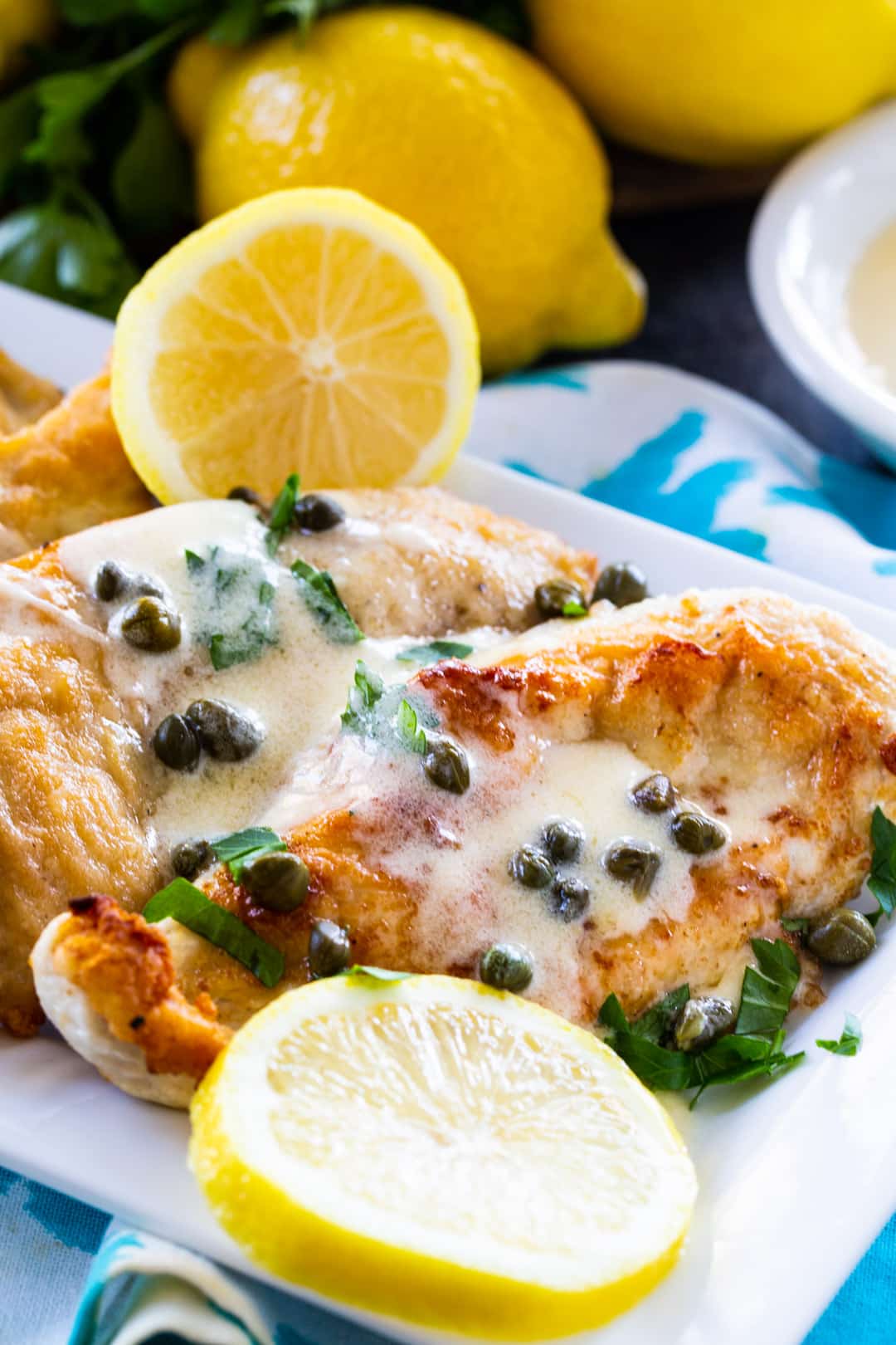 Chicken with Lemon Butter Sauce on serving platter.