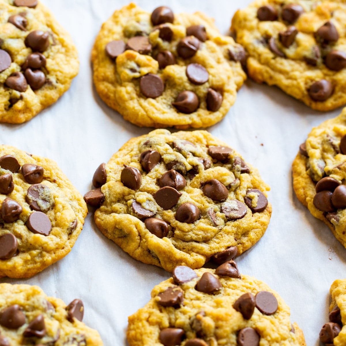 Chocolate Chip Pudding Cookies on parchment paper.