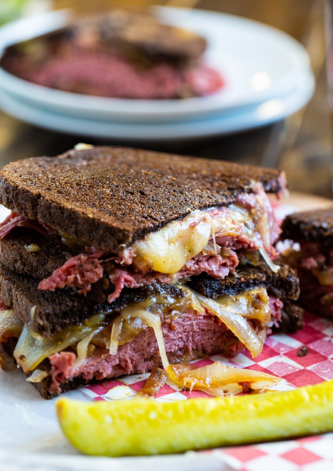 Corned Beef Grilled Cheese cut in half.