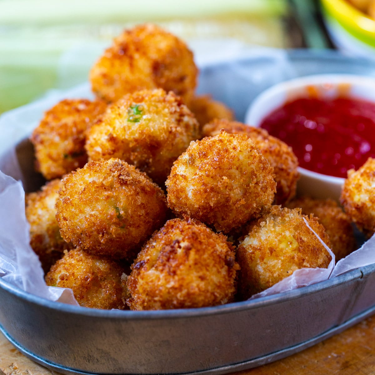 Crispy Fried Grits in metal serving tray.