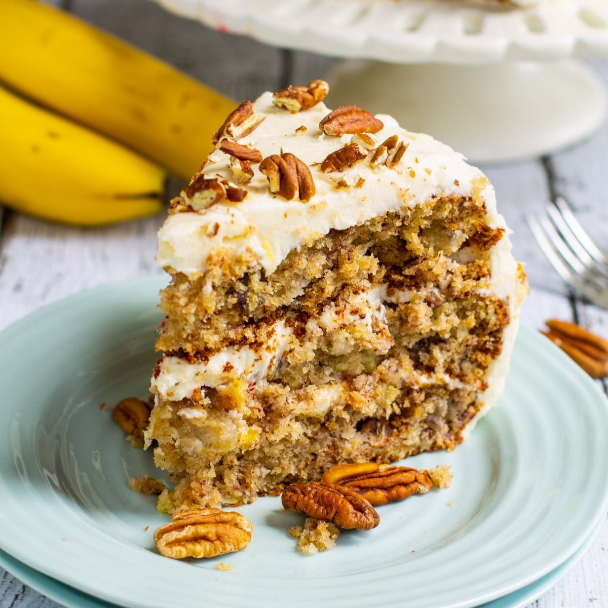 Hummingbird Cake slice on a plate.