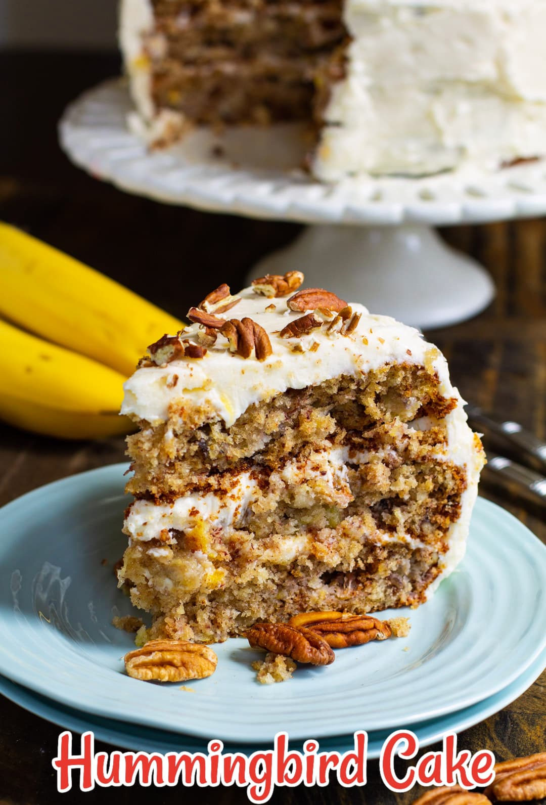 Hummingbird Cake slice on a plate.