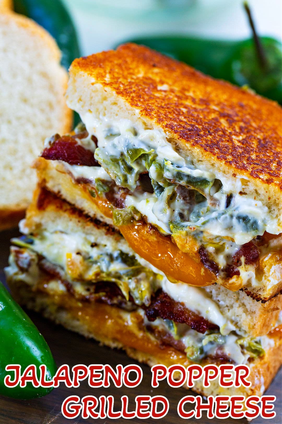 Jalapeno Popper Grilled Cheese slices stacked on top of each other.