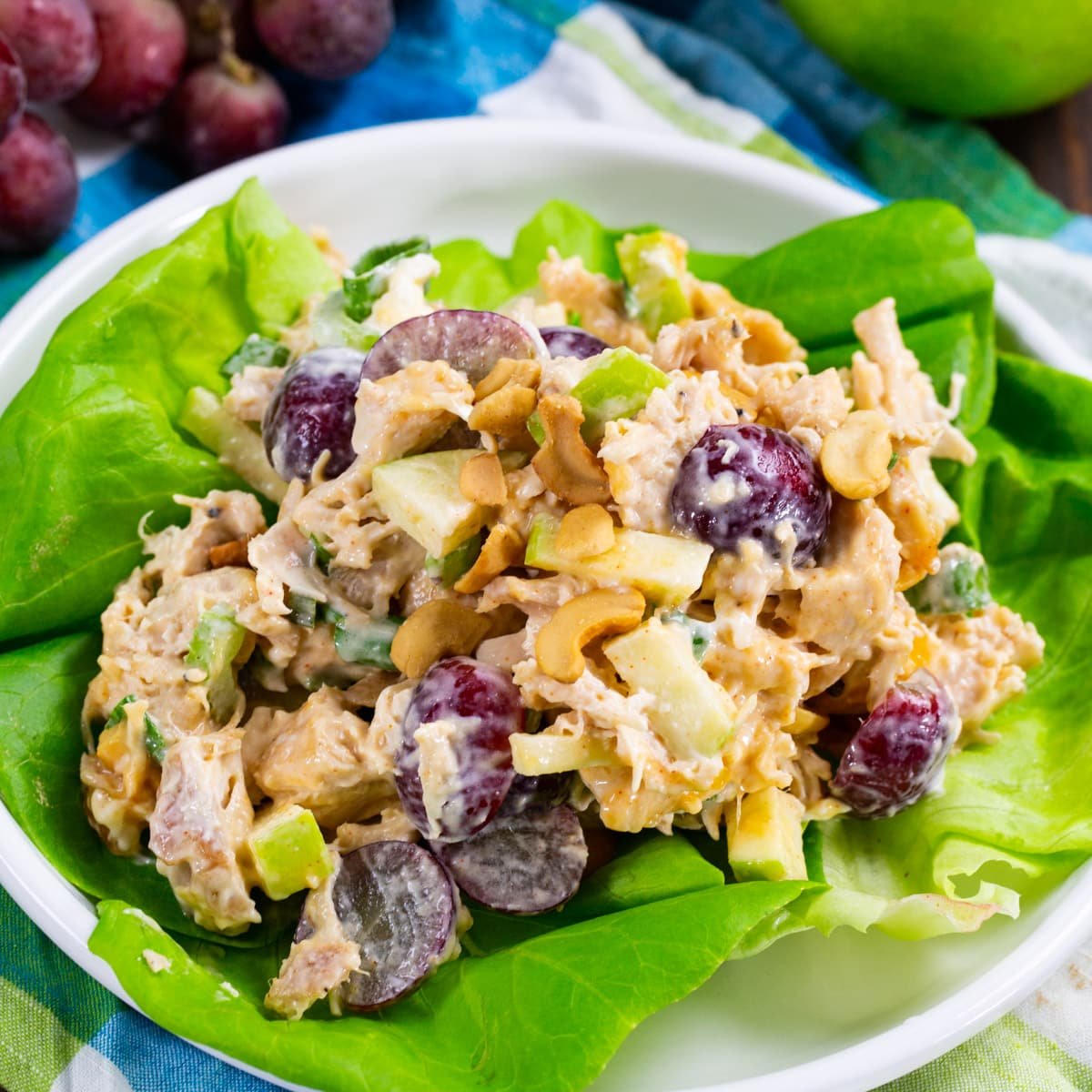 Mango Chutney Chicken Salad connected  a furniture  of lettuce.