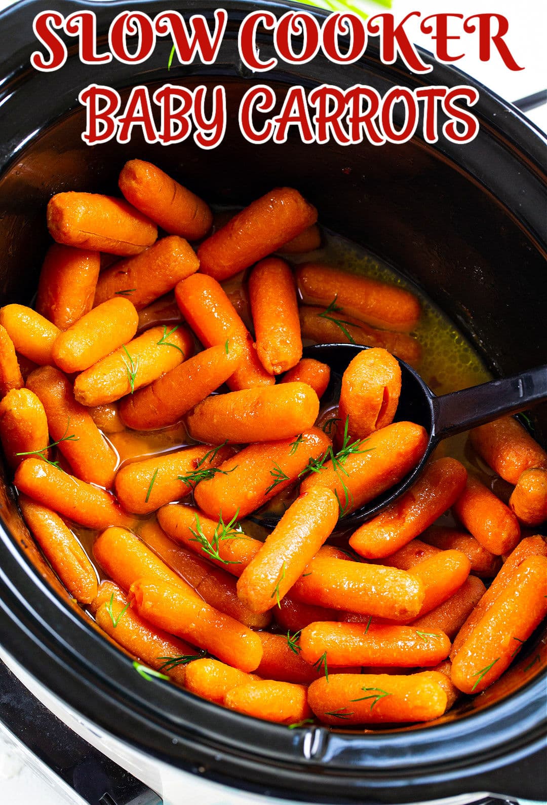 Spoon scooping carrots out of slow cooker.
