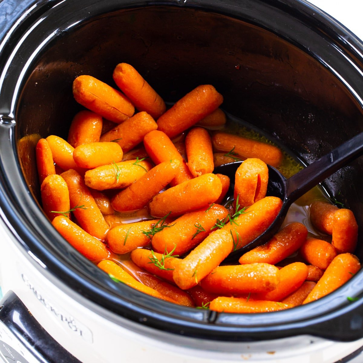 Slow Cooker Baby Carrots in slow cooker.