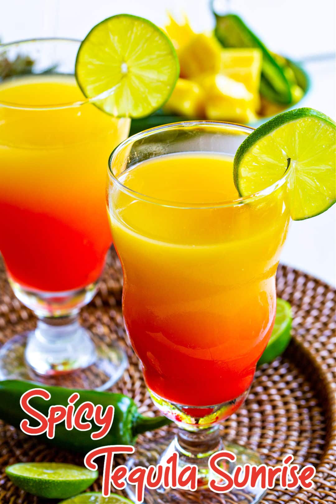 Spicy Tequila Sunrise in cocktail glasses.