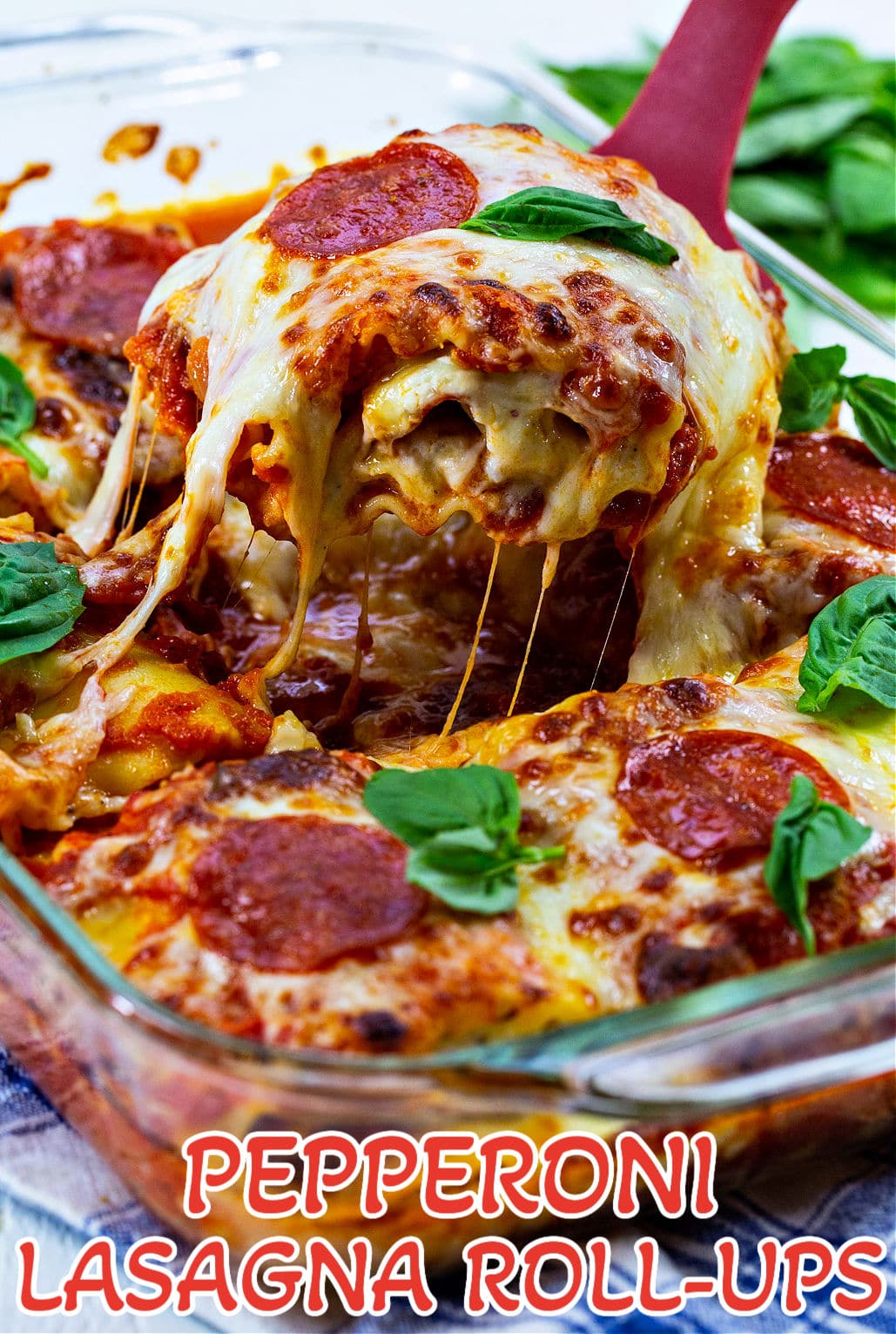 Pepperoni Lasagna Roll-Ups in baking dish.