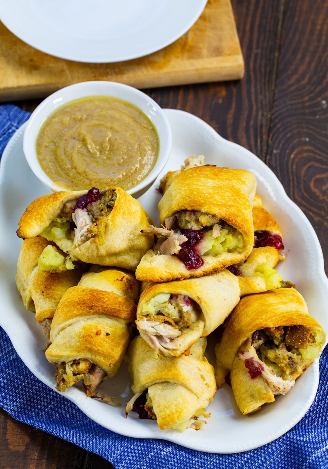 Thanksgiving Crescent Rolls on serving plate.