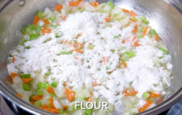 Adding the flour.