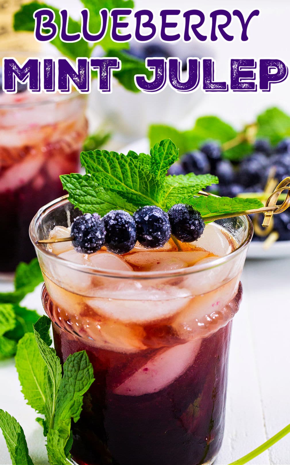Blueberry Mint Julep in glass with fresh mint.