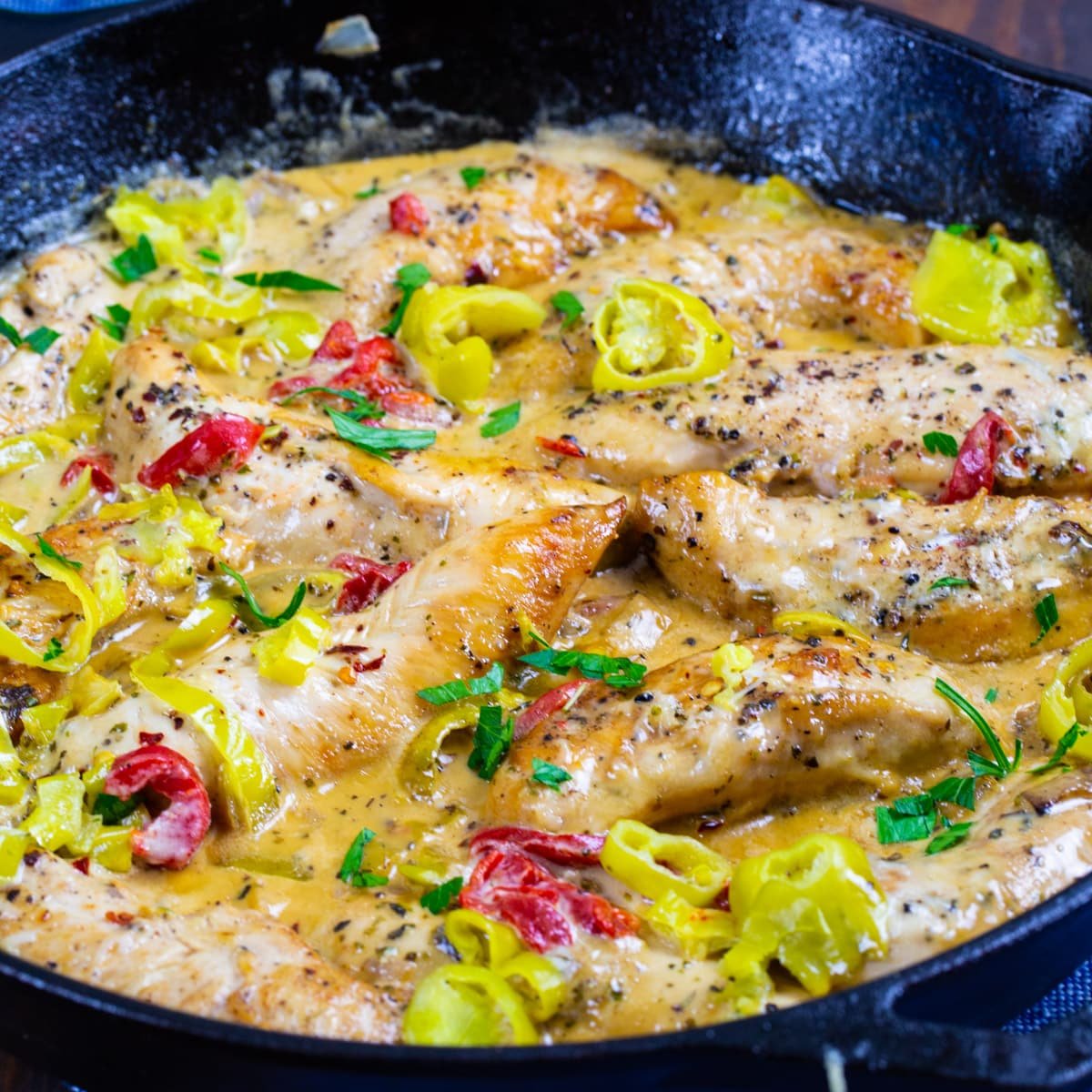 Creamy Pepperoncini Chicken in a cast iron skillet.