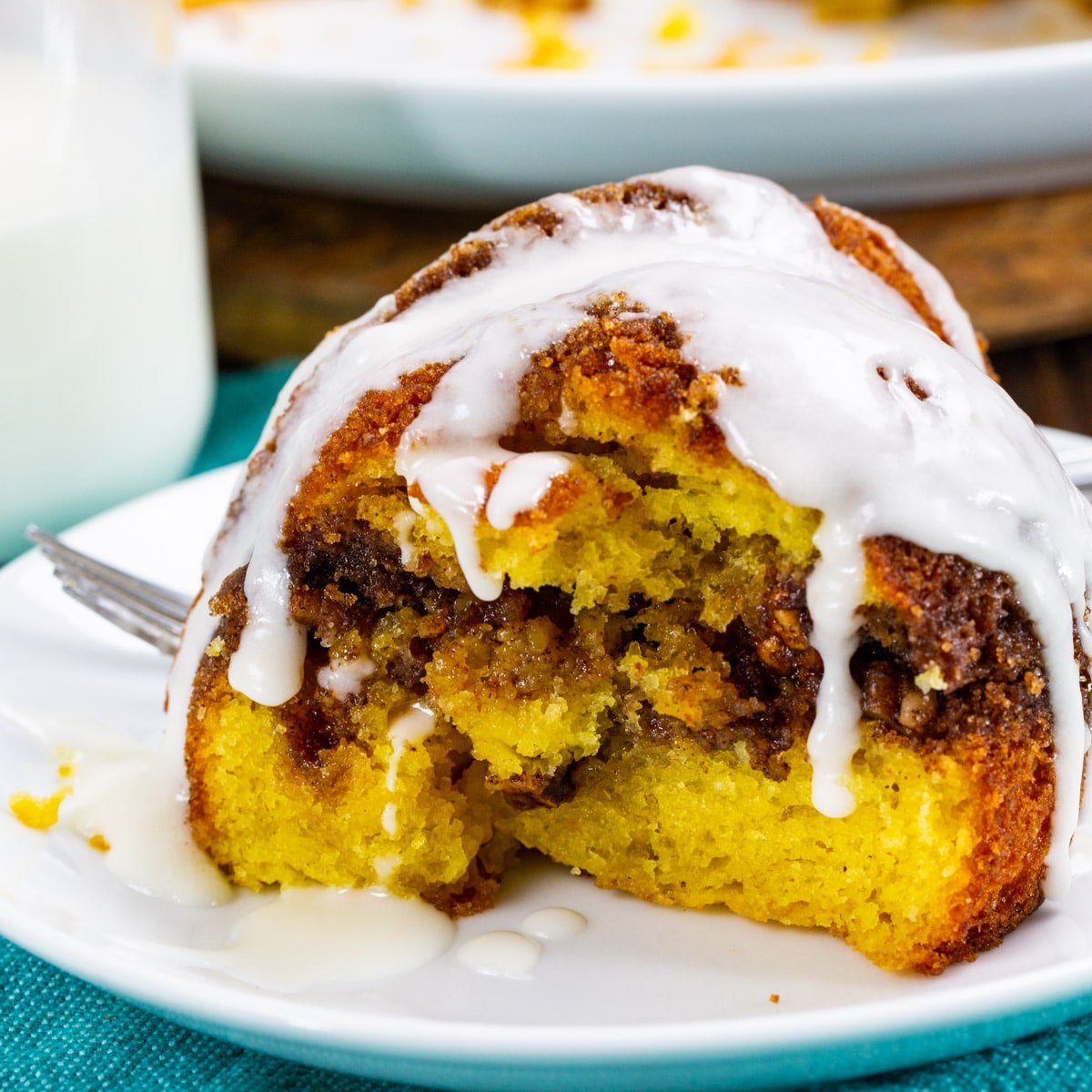 Slice of Honey Bun Bundt Cake on plate.