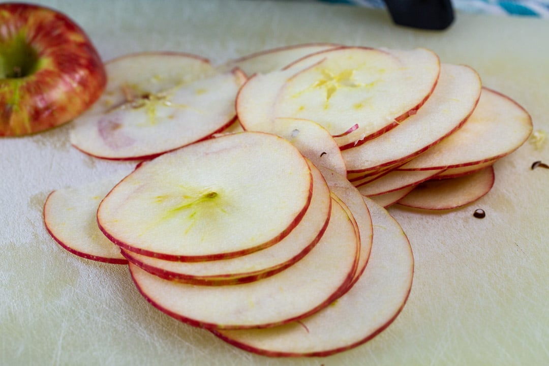 Thin slices of fresh apple.
