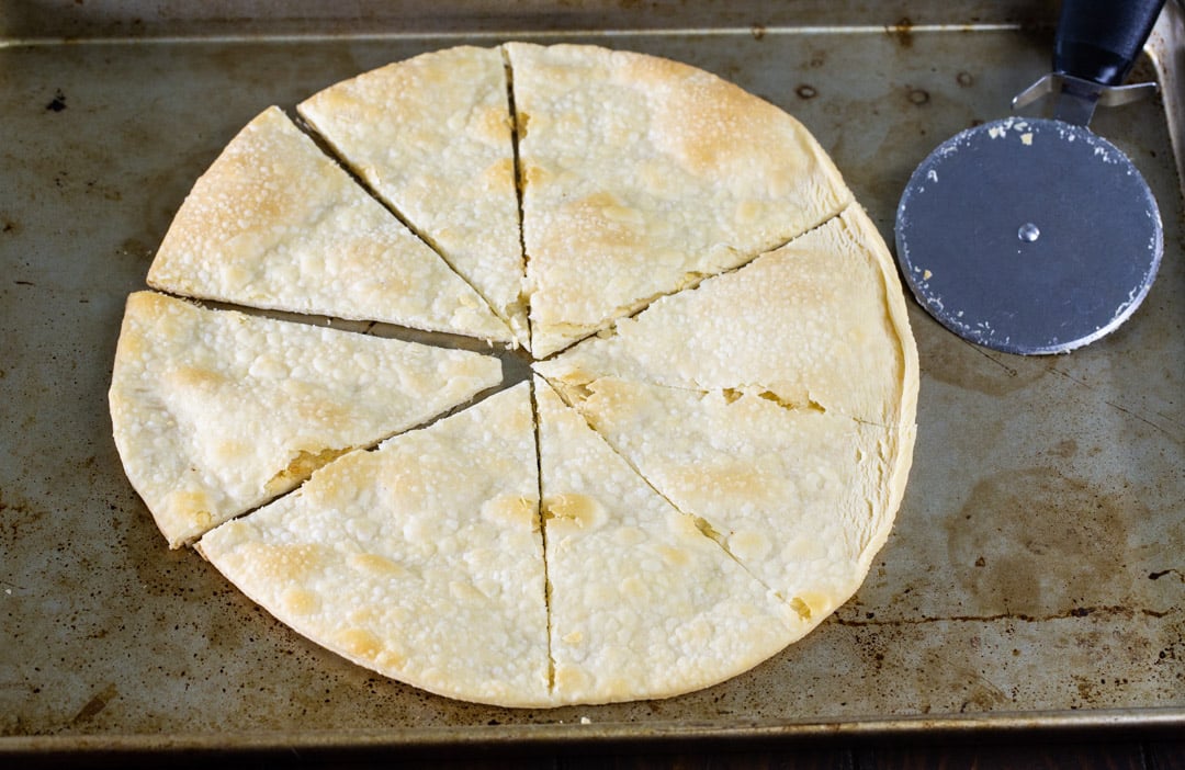 Baked pastry  crust chopped  into wedges.