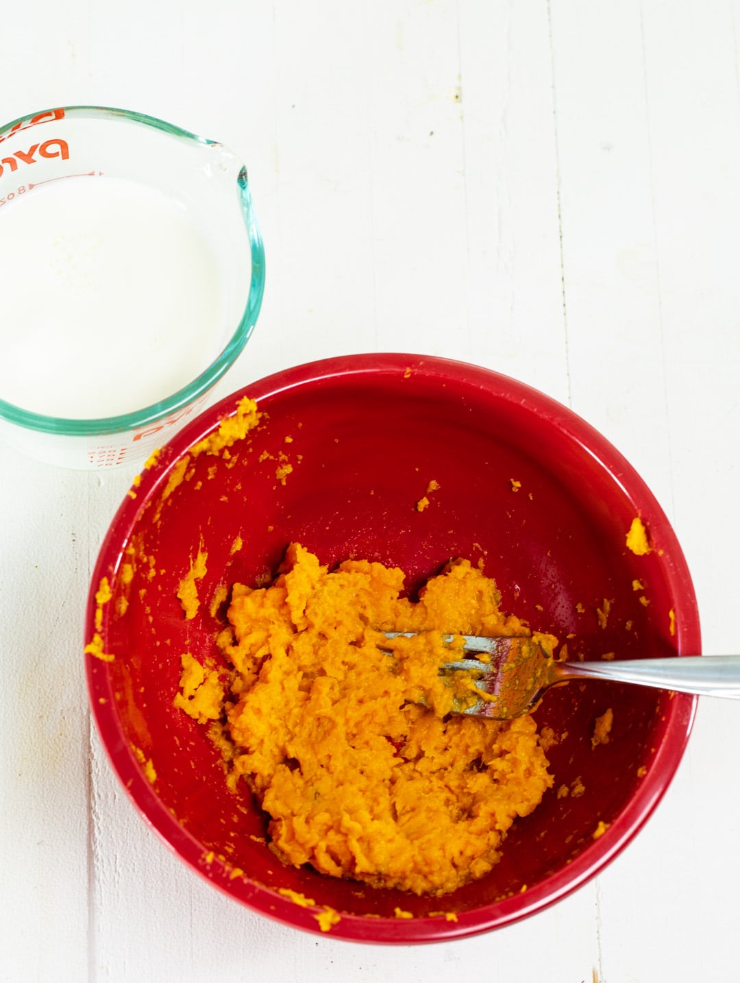 Mashed sweet potato in a bowl.