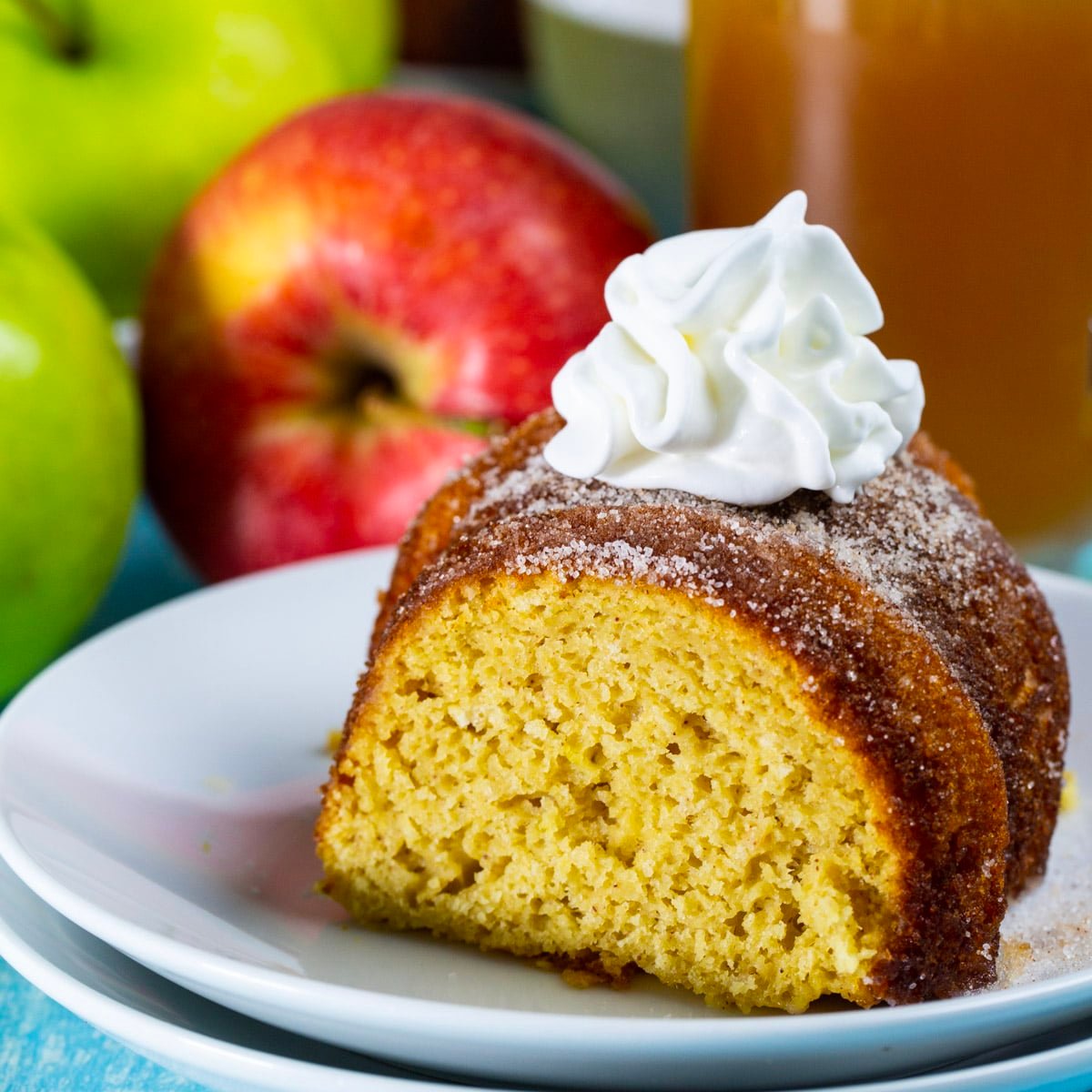 Slice of Apple Cider Cake on a plate.
