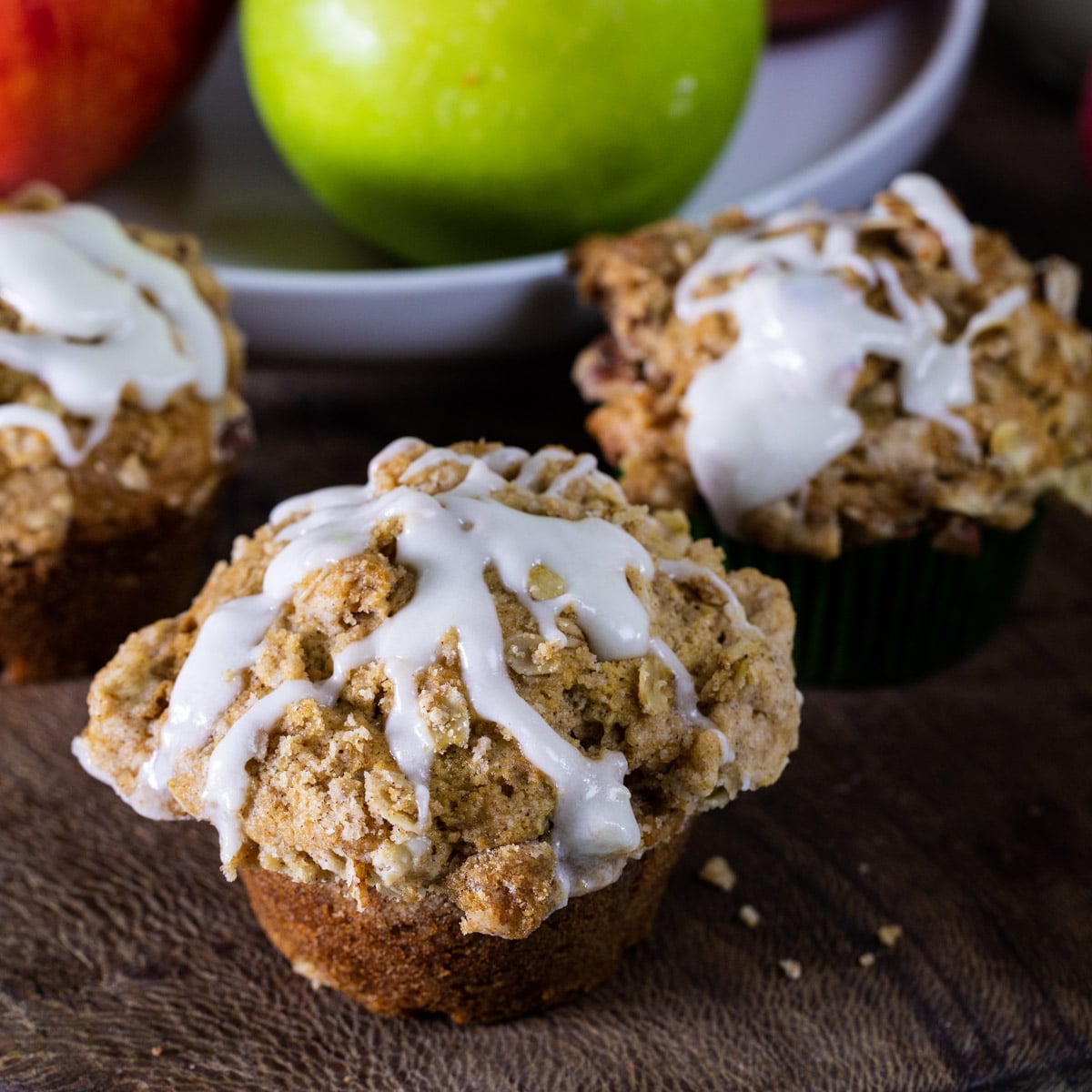 Apple Spice Muffins drizzled with glaze.