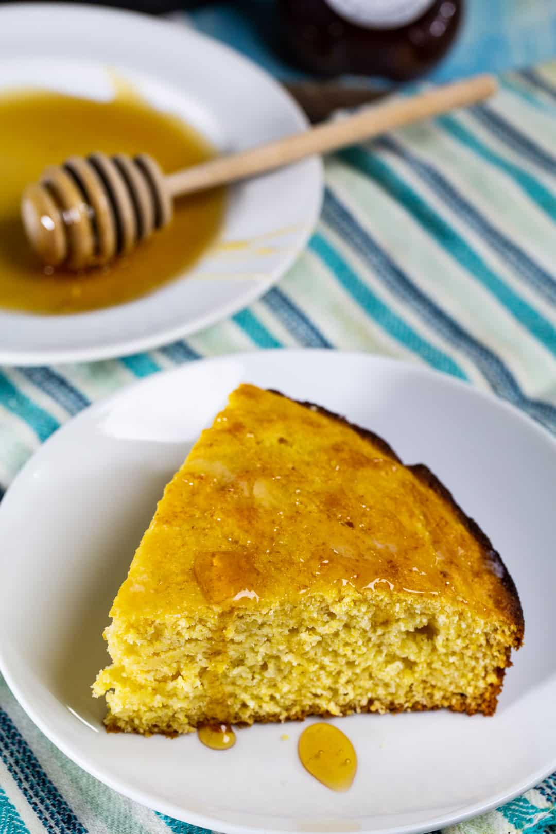 Honey Cornbread portion    connected  a plate.