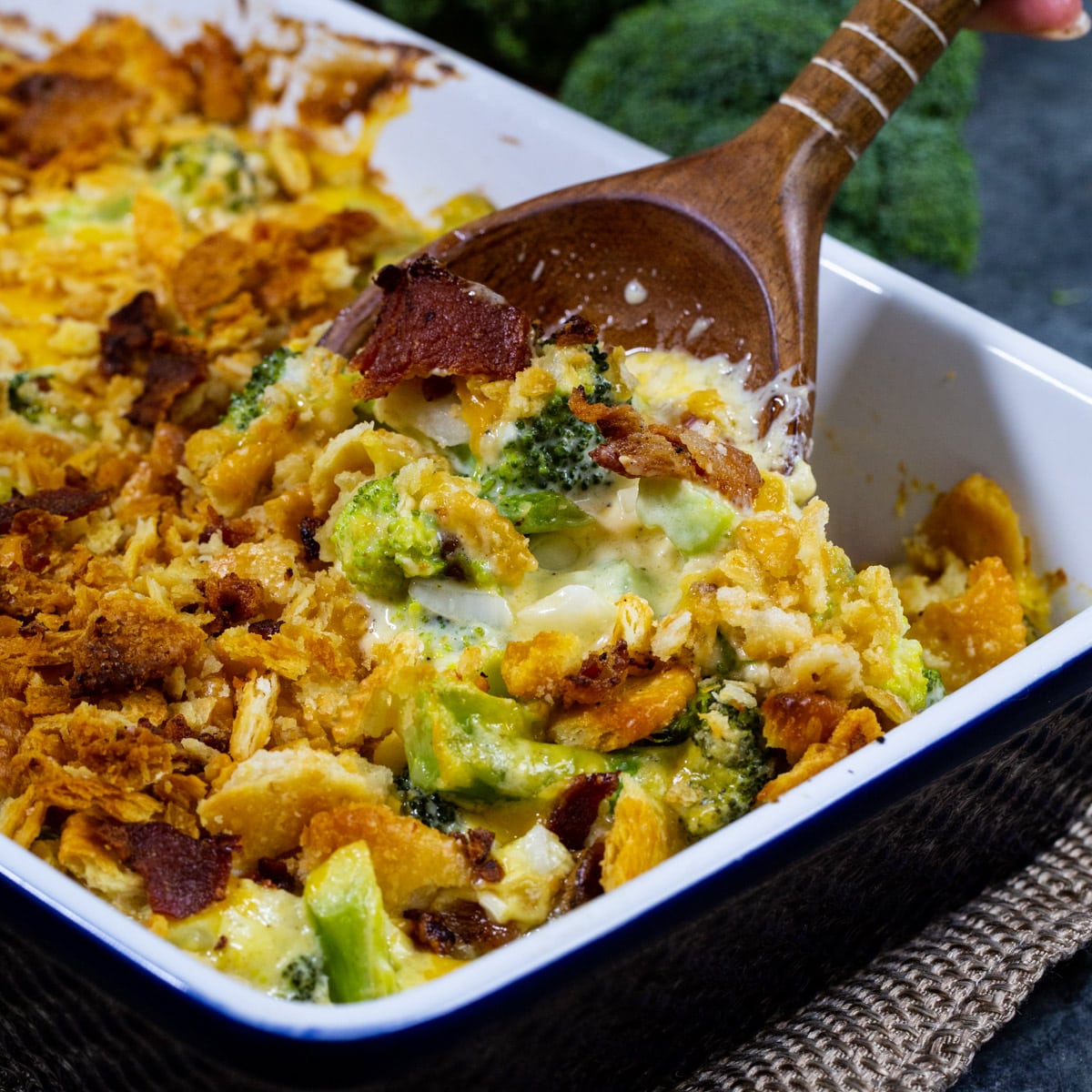 Spoon scooping up Loaded Broccoli Casserole.