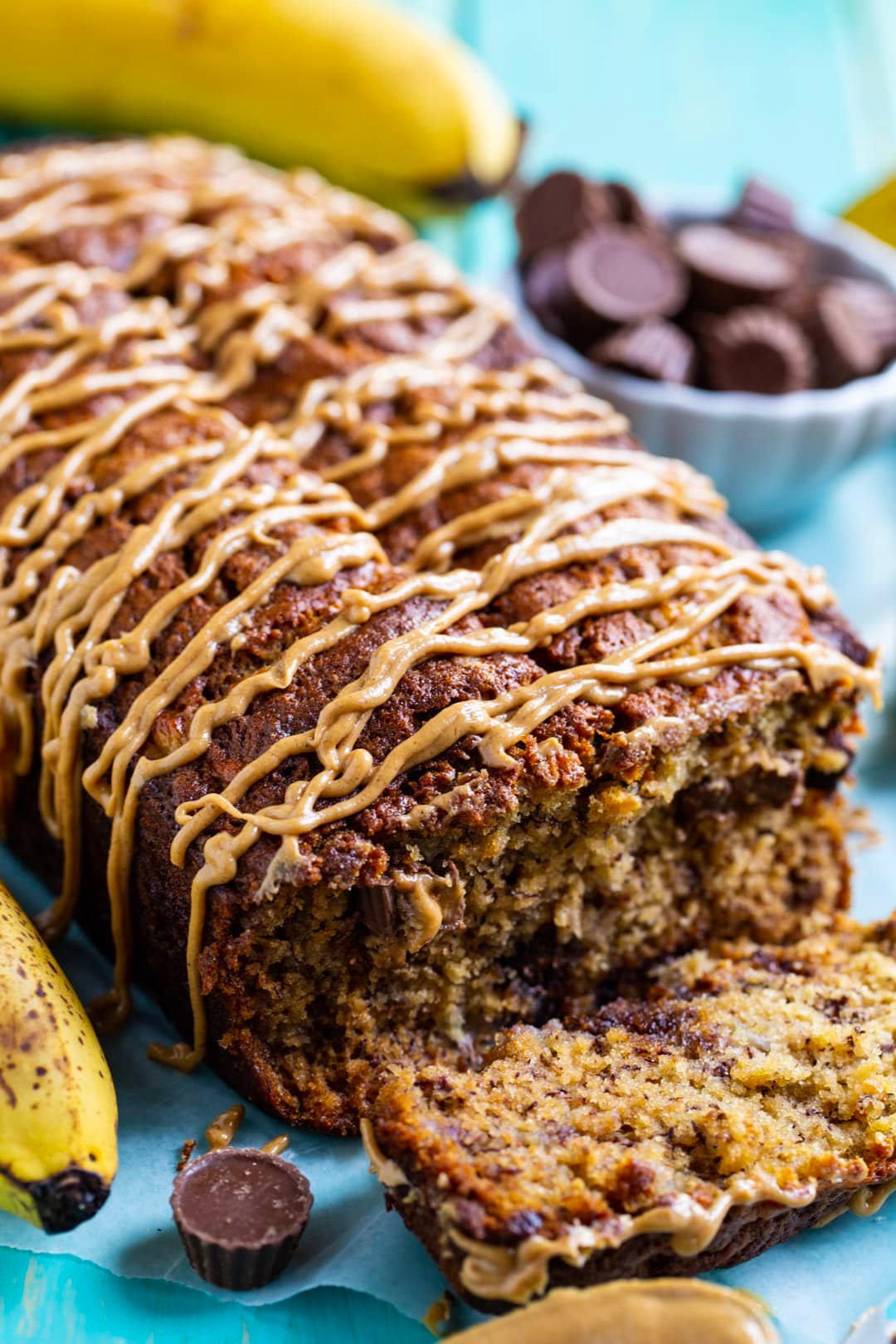 Peanut Butter Cup Banana Bread with slice cut.