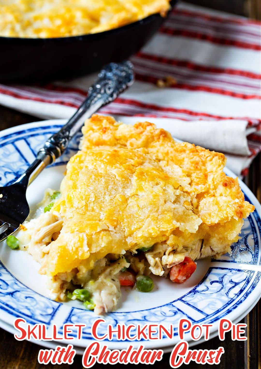 Slice of Skillet Chicken Pot Pie with Cheddar Crust on a plate.