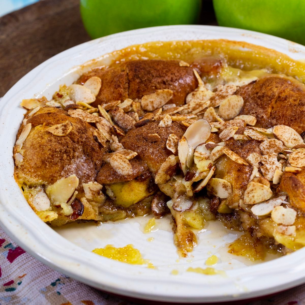 Apple Crescent Casserole with a piece cut out.