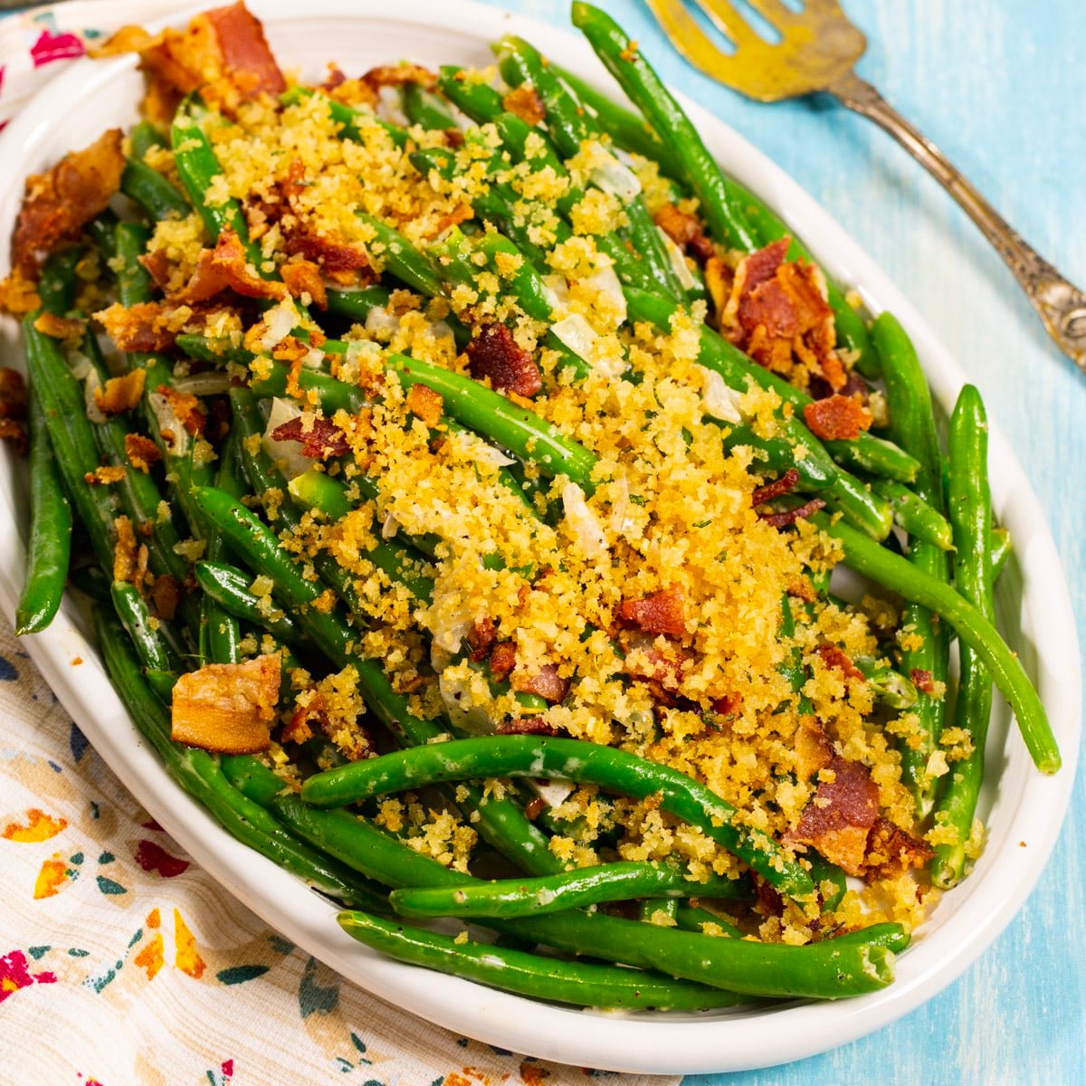 Green Beans with Bacon Breadcrumbs on a serving plate.