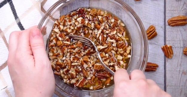 Pecans soaking in bourbon.