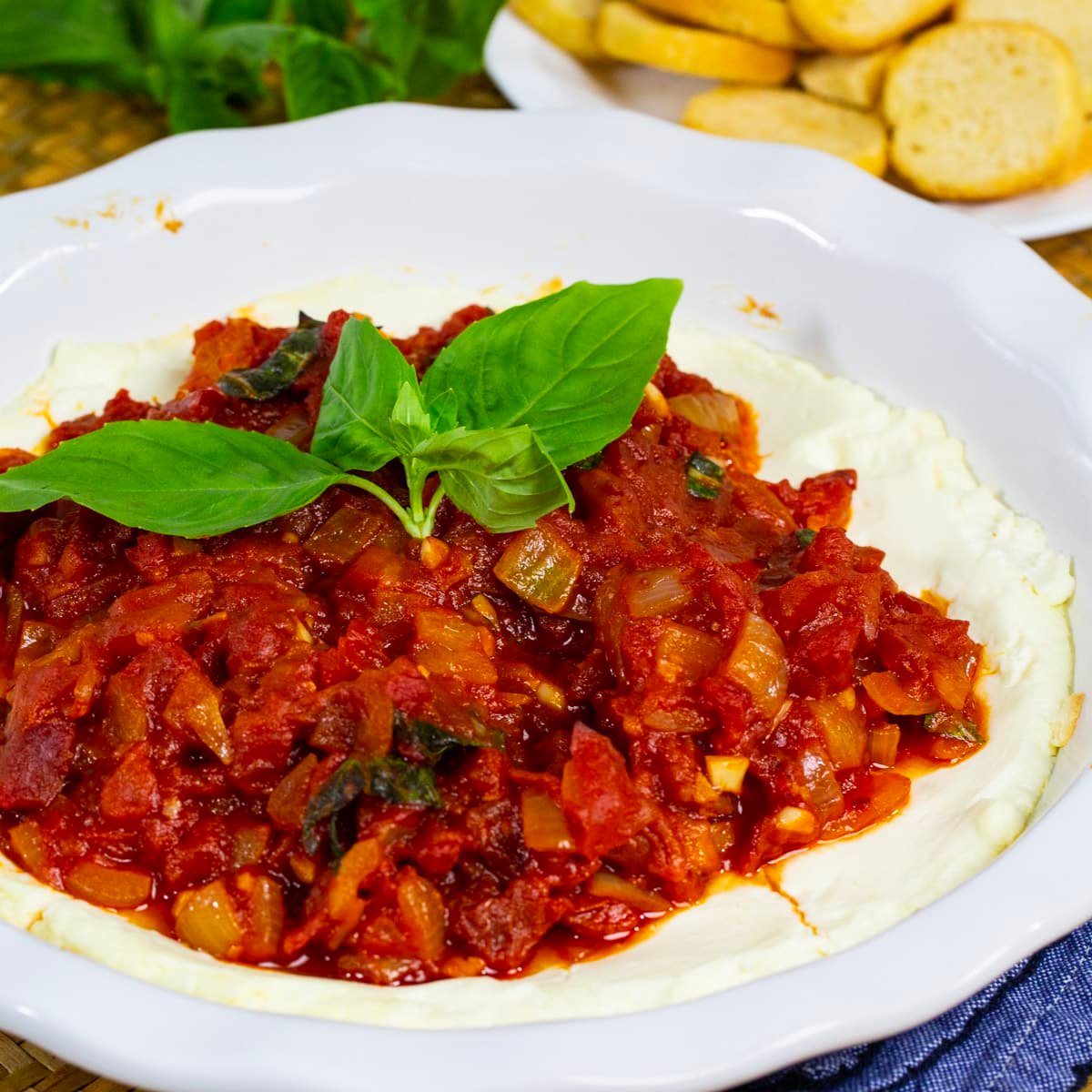 Baked Goat Cheese Dip in pie plate.