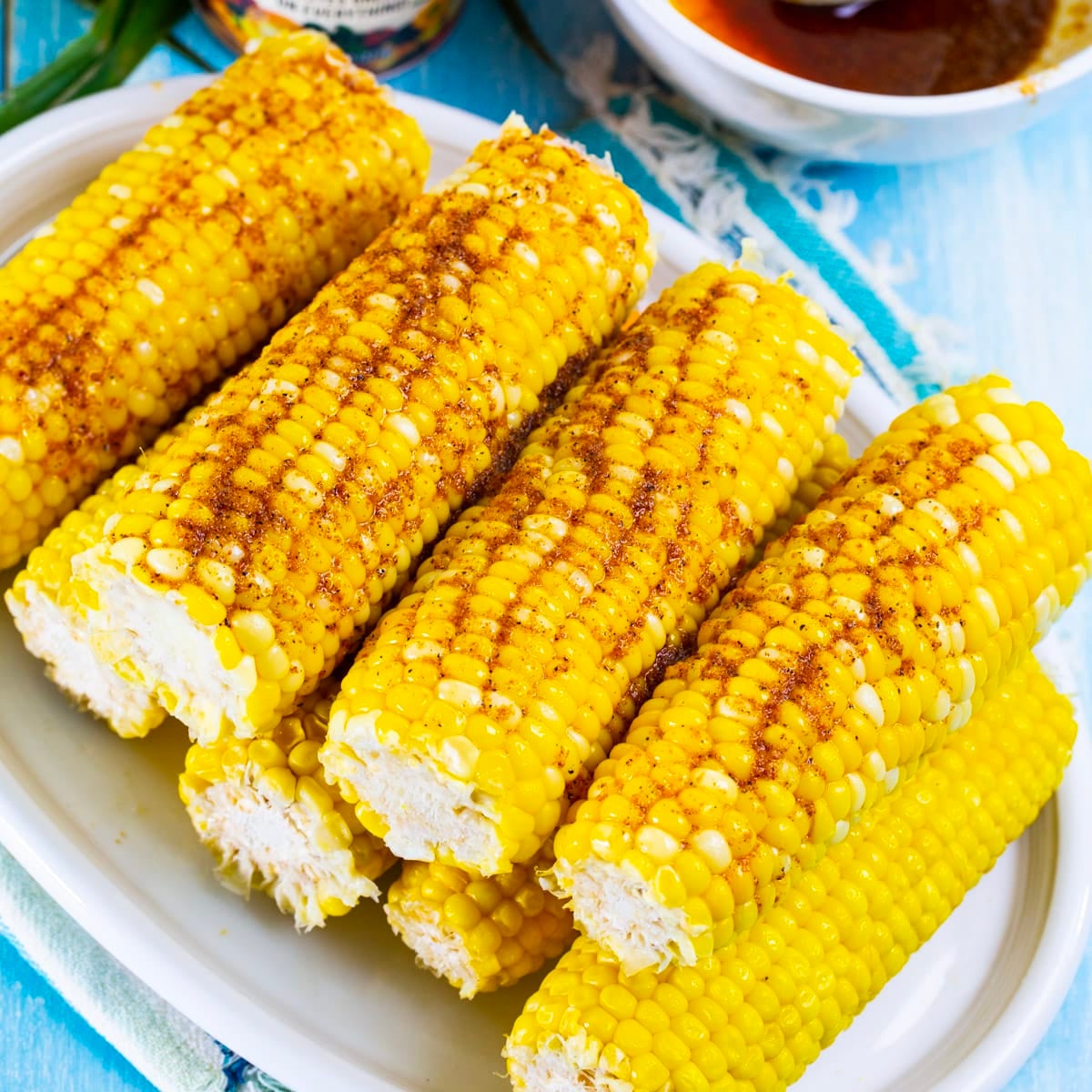 Cajun Buttered Corn on a serving plate.