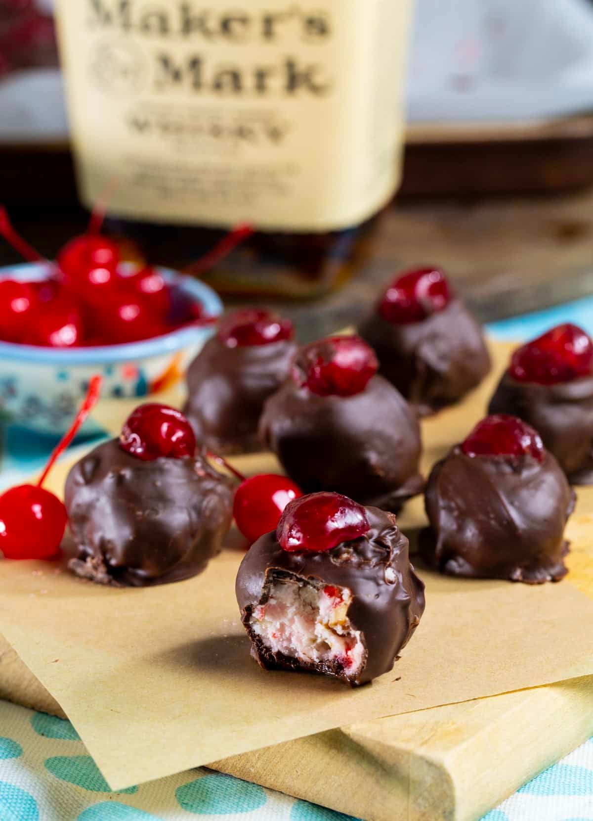 Cherry Bourbon Balls with bite taken out of one.