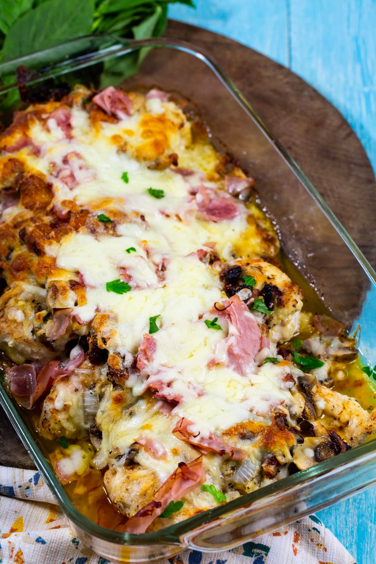 Company Chicken topped with ham, mushrooms and cheese.