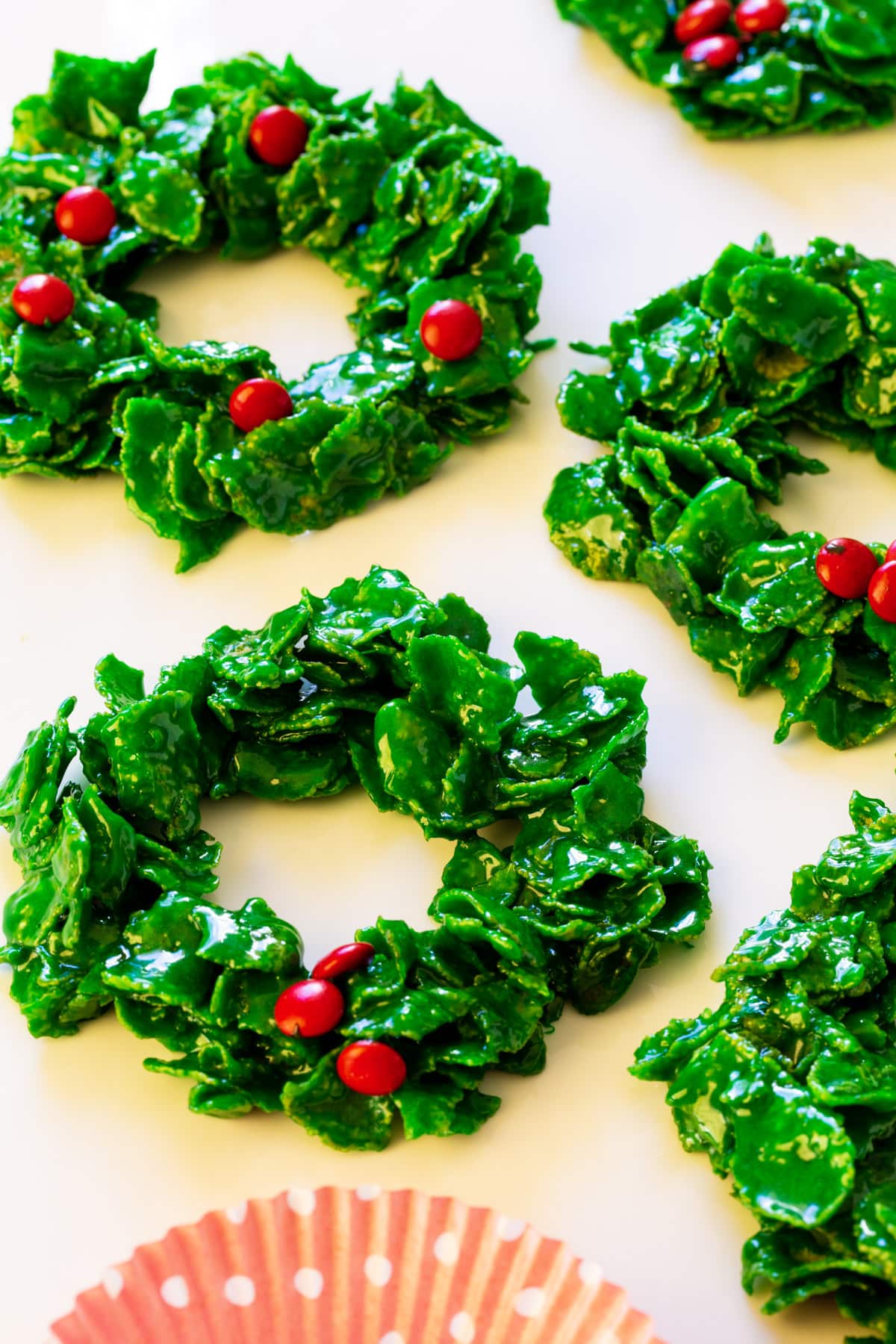 Cornflake Christmas Wreaths spread out on white background.