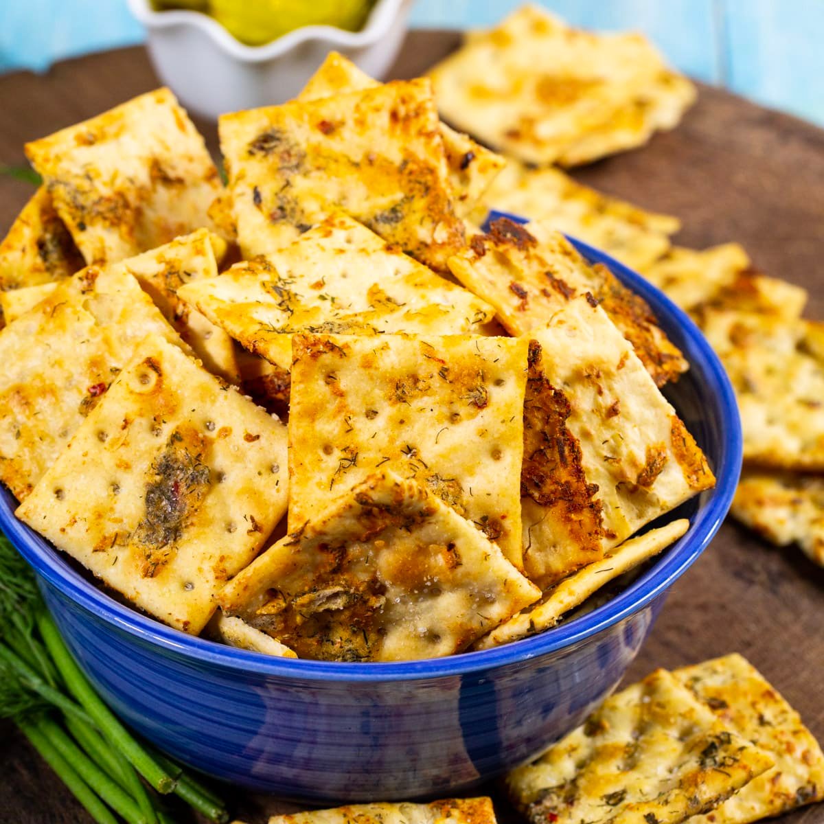 Dill Pickle Saltines in a blue bowl.