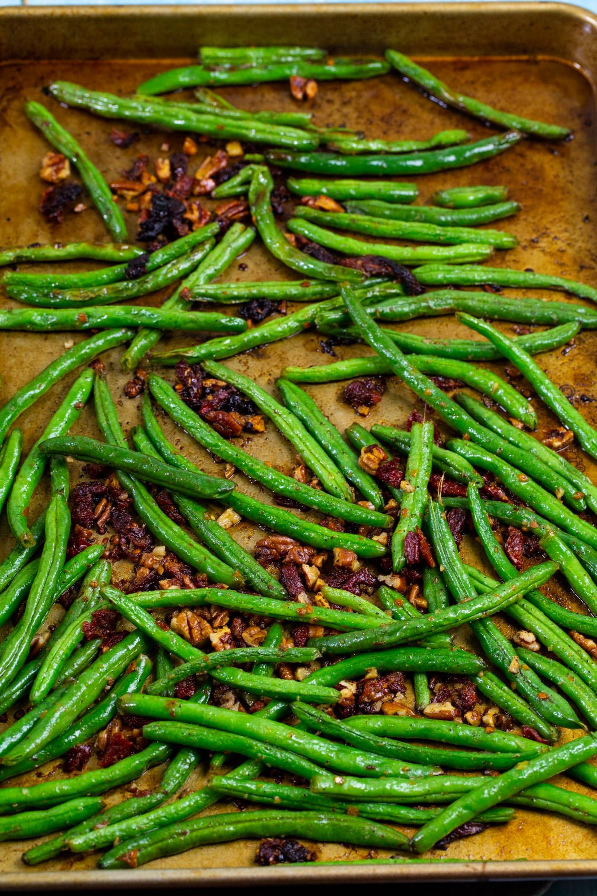 Green beans on a baking sheet.