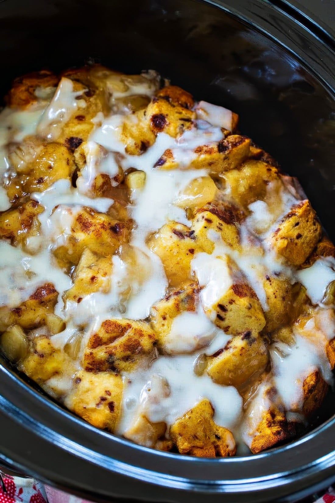 Apple Pie Cinnamon Roll Casserole in a slow cooker.