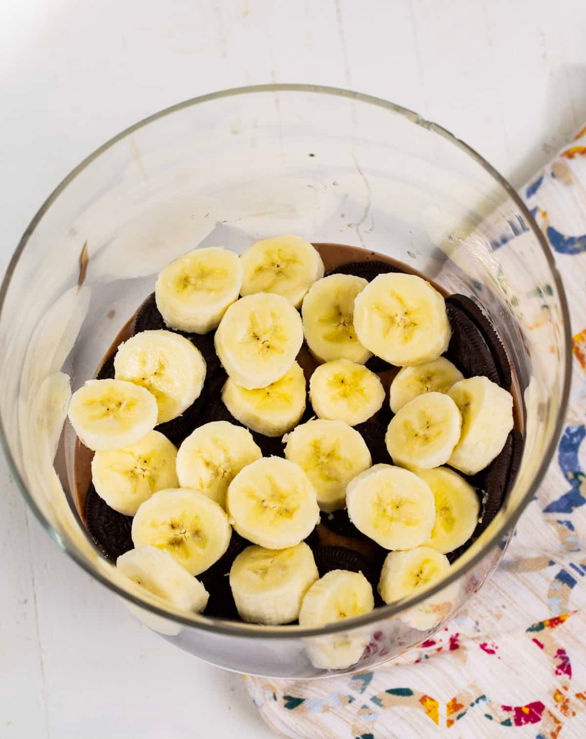 Banana slices placed on top of oreos.