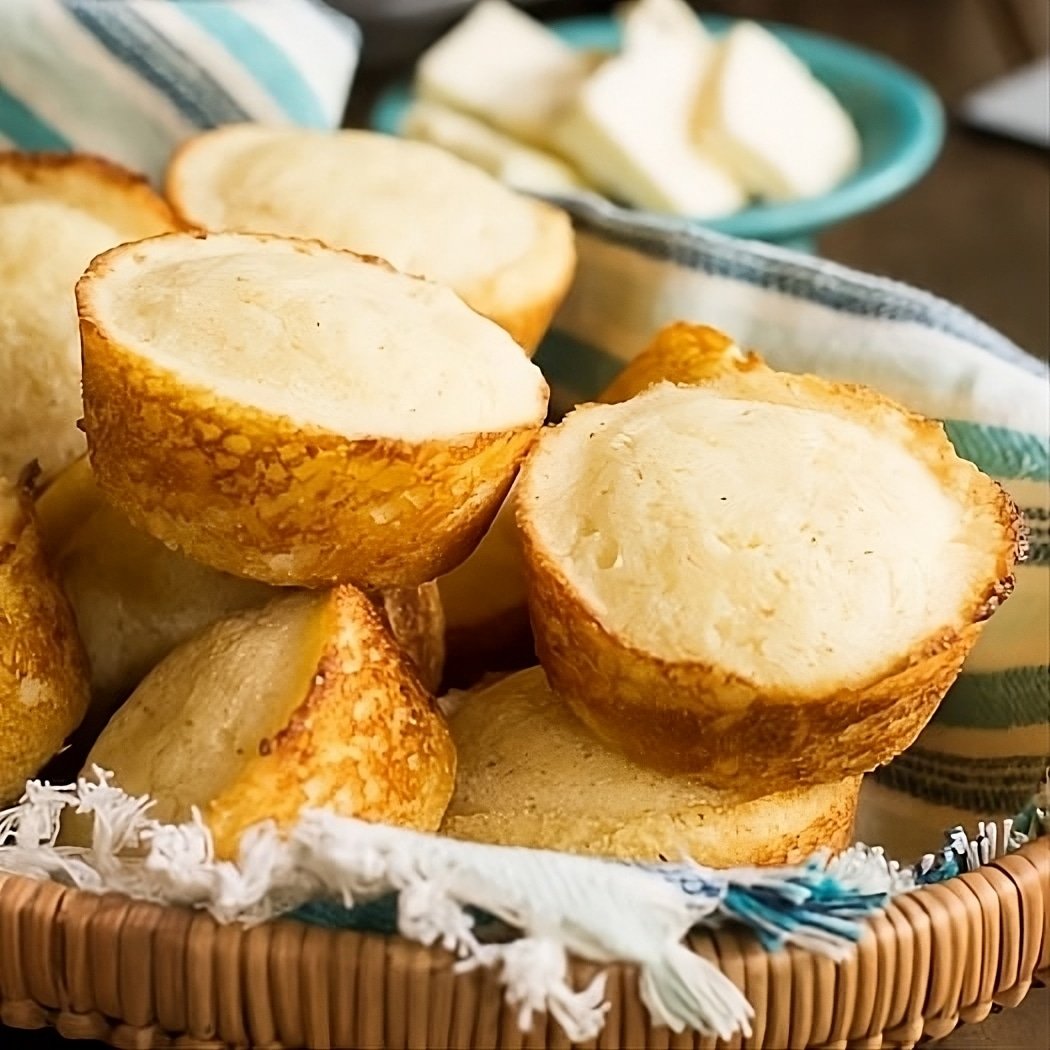 Buttermilk Cornbread Muffins in a basket.
