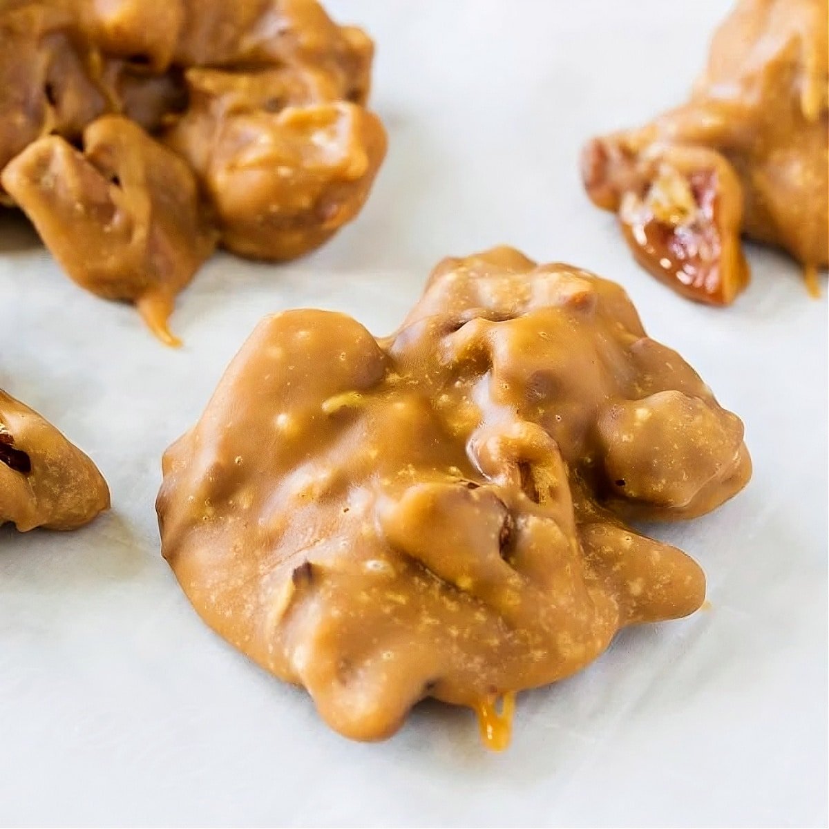 Microwave Pralines on a piece of parchment paper.