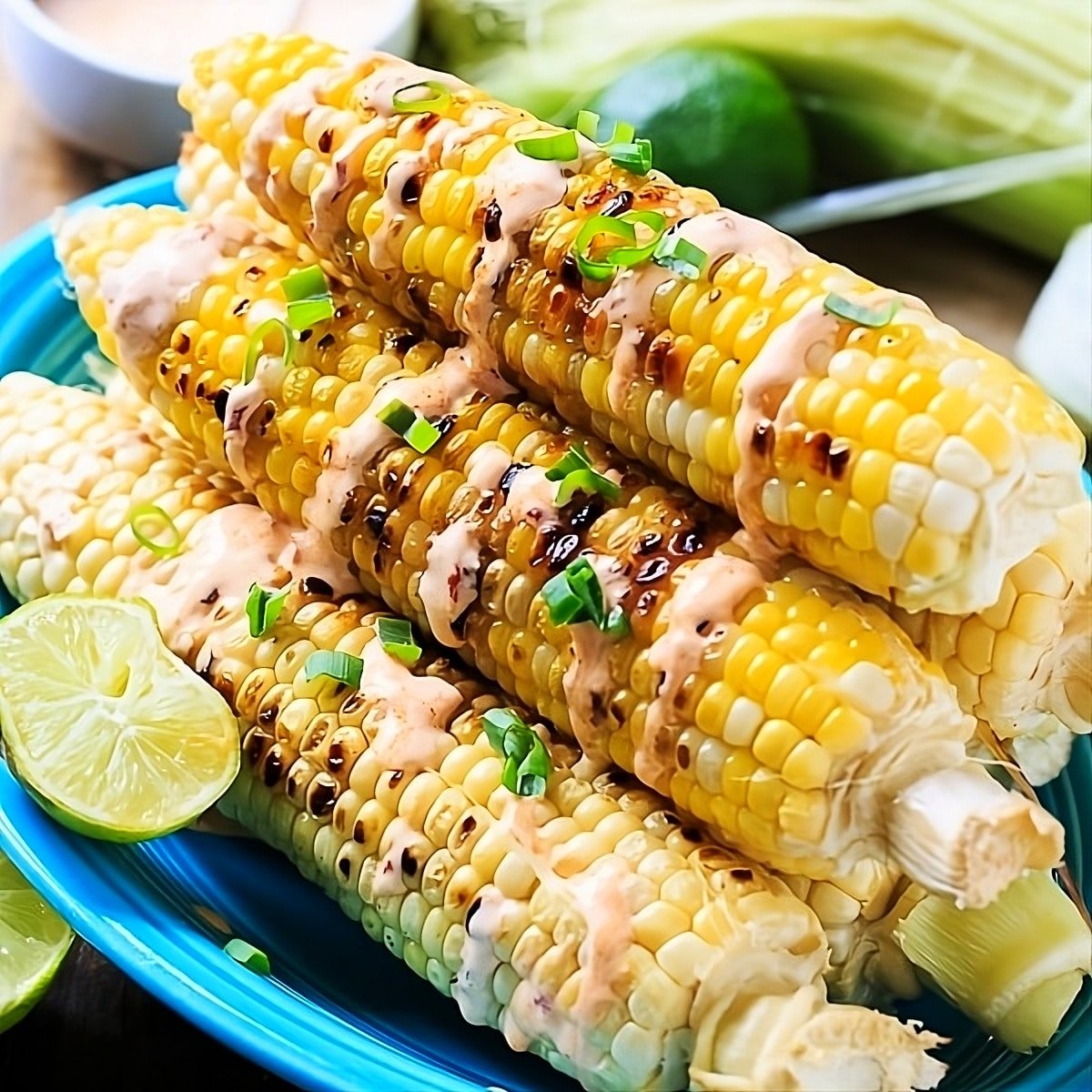 Grilled Corn on a serving platter.