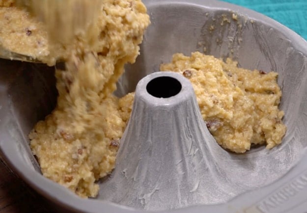 Transferring batter to pan.