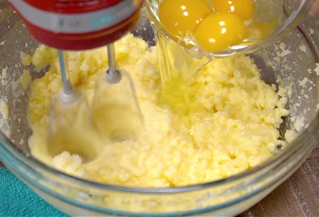 Mixing in eggs.