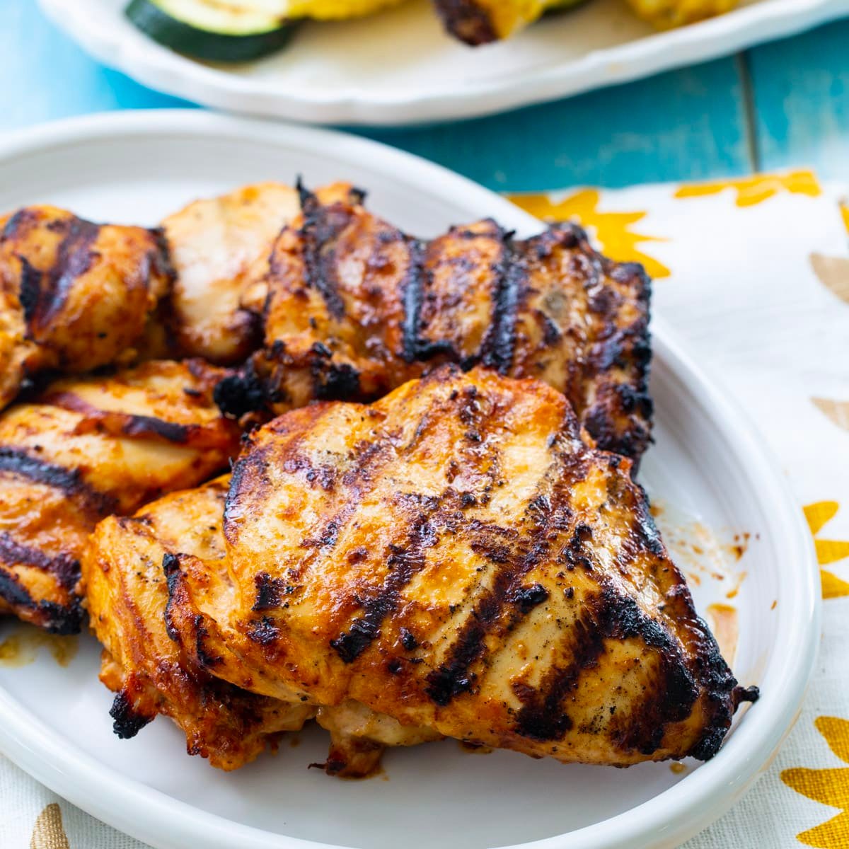 BBQ Mayo Marinated Grilled Chicken on a serving plate.