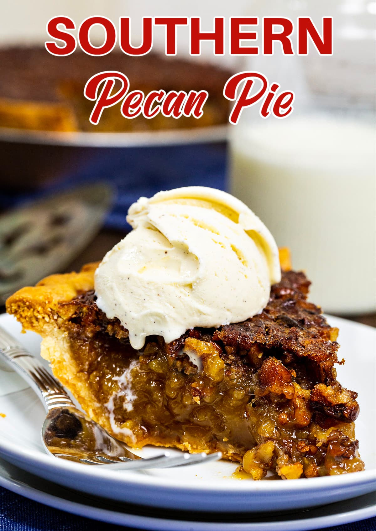 Slice of pie topped with vanilla ice cream.