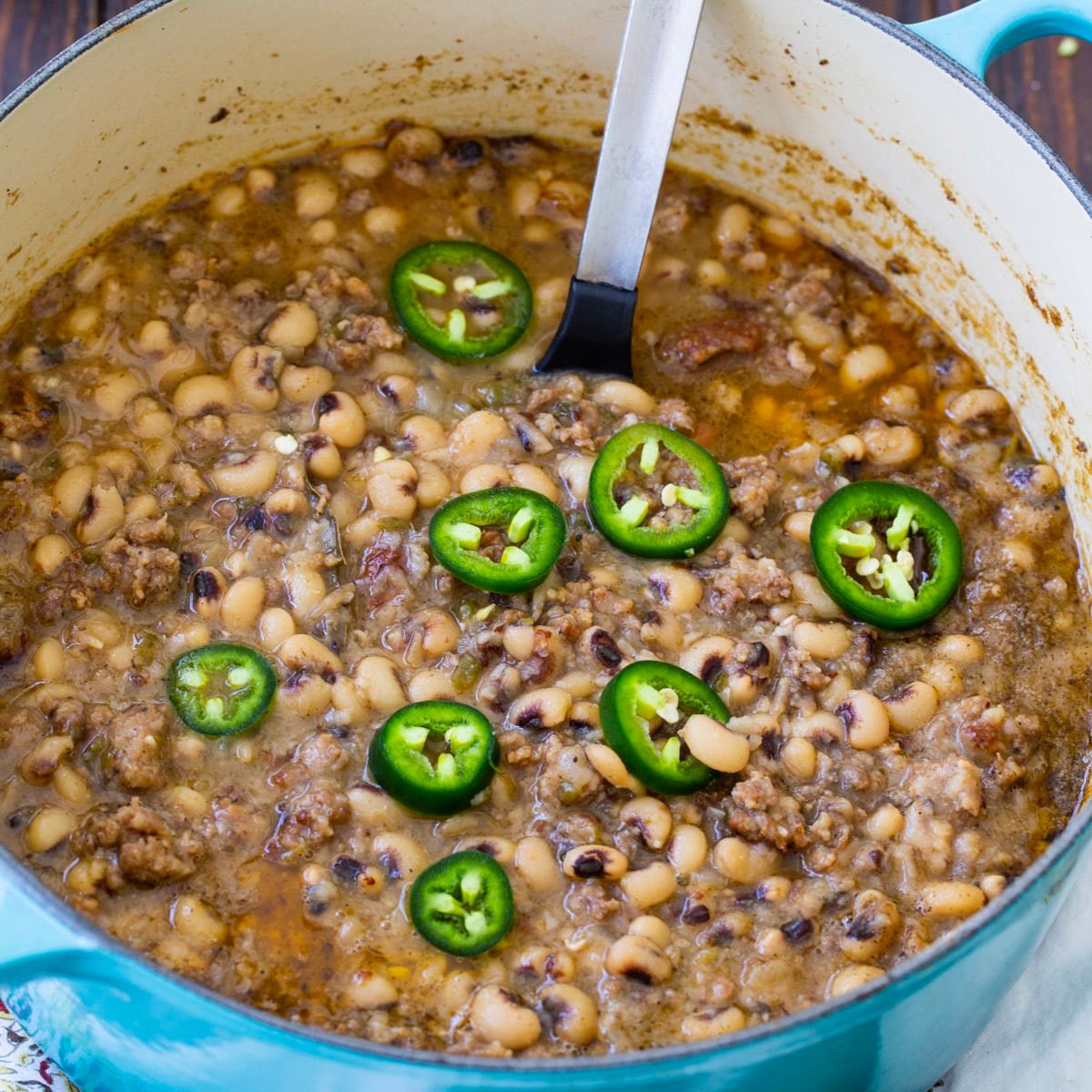 Black-Eyed Peas with Jalapeno in a Dutch oven.