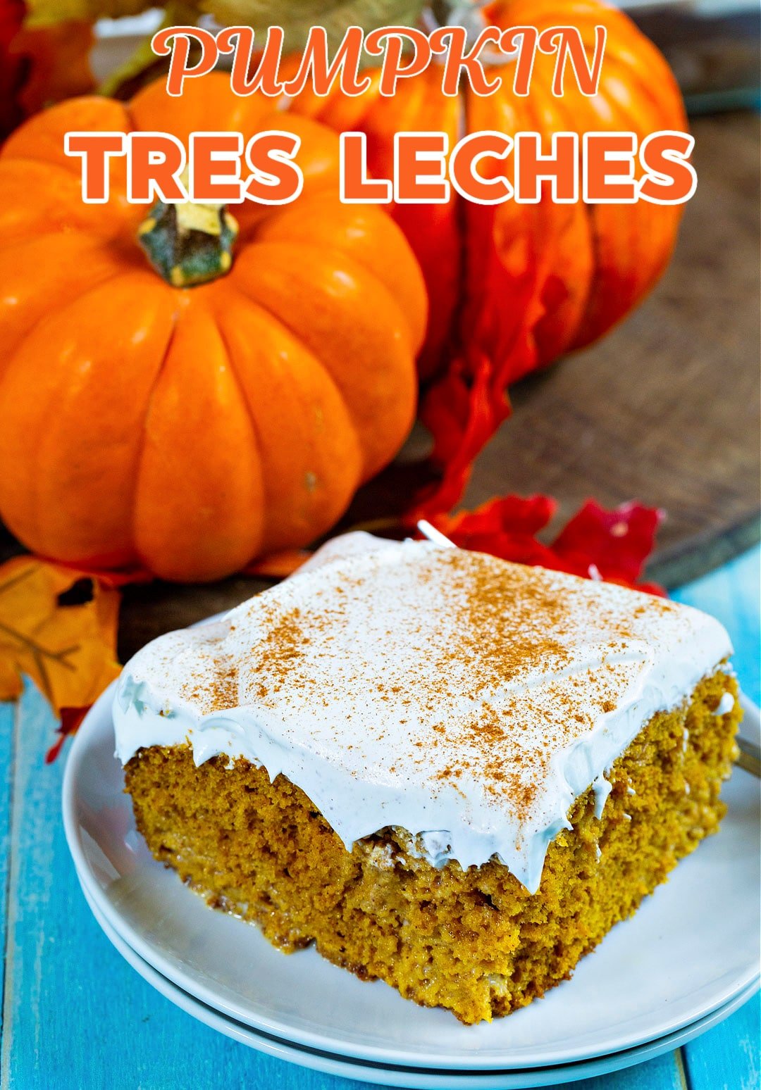Slice of Pumpkin Tres Leches Cake on a plate.